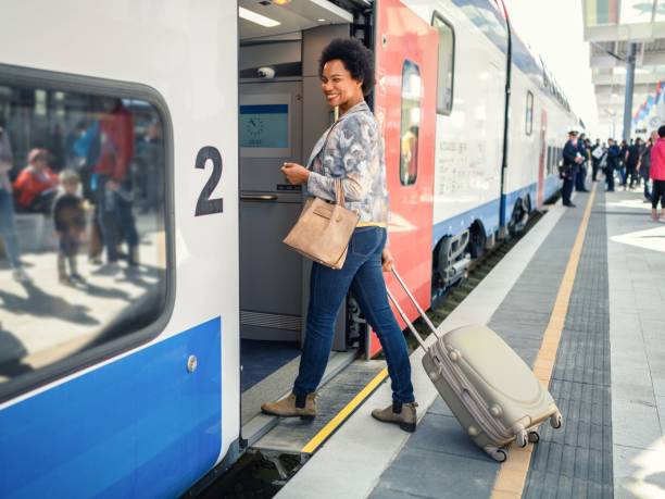 istock African-American woman entering train 1388252821