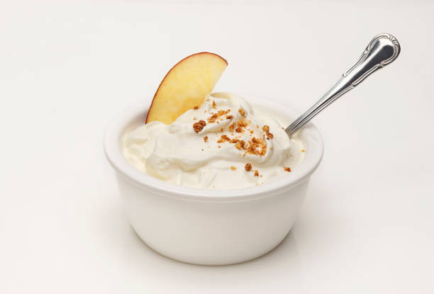 yogurt served with apple and nuts - yogurt greek culture milk healthy eating imagens e fotografias de stock