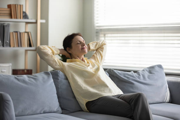 istock Peaceful cheerful lady enjoying leisure time, emotional harmony 1388253748