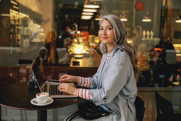 istock Good looking female working at coffee shop 1388255053