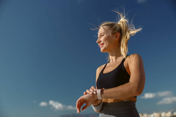 istock Young woman going in for sport on summer day 1388255441