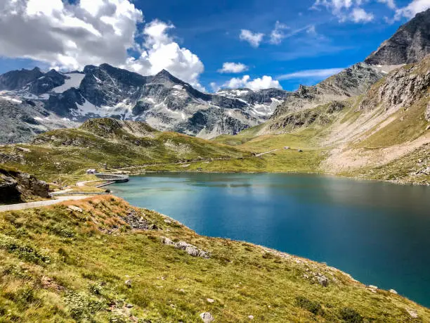 Agnel Lake is a lake at Ceresole Reale in the Province of Turin, Piedmont, Italy, near the Nivolet Pass. The reservoir on the Orco river is located at an elevation of 2300 m.