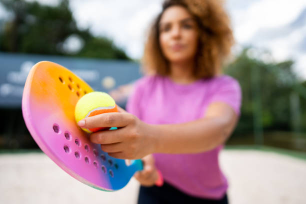 istock Woman playing beach tennis 1388261734