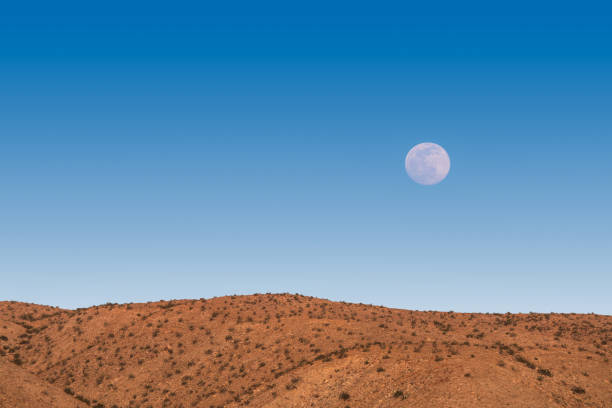 istock desert mountain range dusk clear sky full moon clean air atmosphere landscape 1388263831