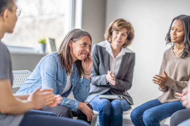 istock Encouraging Each Other in Therapy 1388265661
