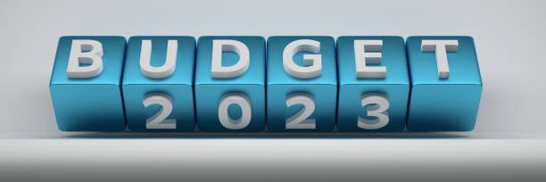 Wide banner with large words Budget 2023 on large blue cubes stock photo