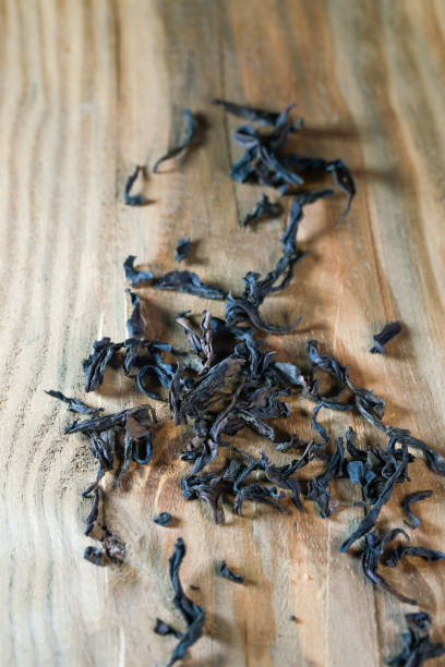 istock Da Hong Pao Oolong tea on a wooden board 1388267610