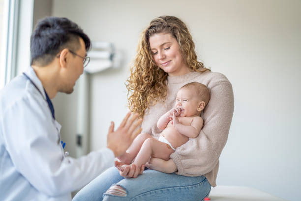 istock Baby Boy at the Doctors 1388268542