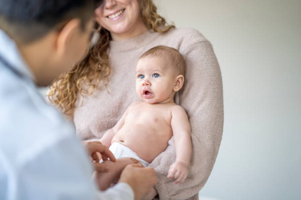 istock Baby Boy at the Doctors 1388268544