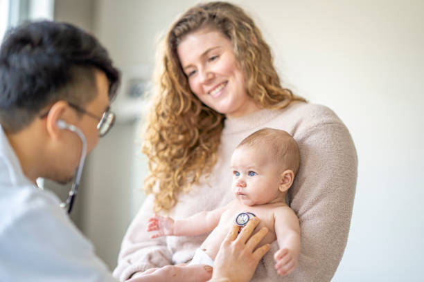 istock Mother and Son at the Doctors 1388268547