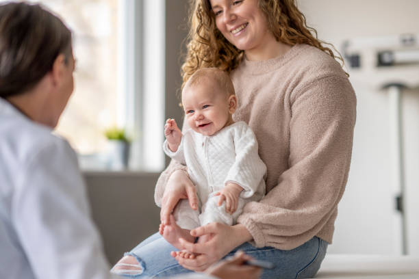 istock Mom and Baby at an Appointment 1388268553