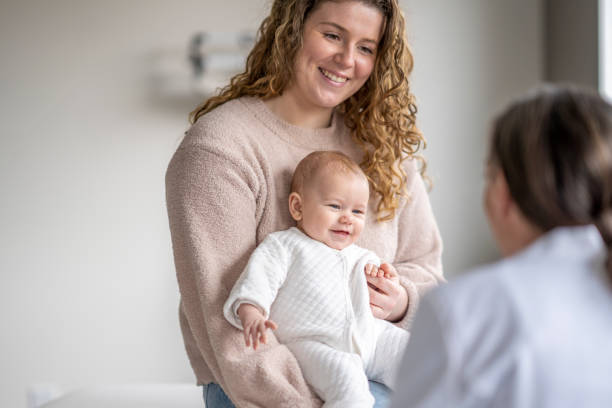 istock Mom and Baby at an Appointment 1388268557