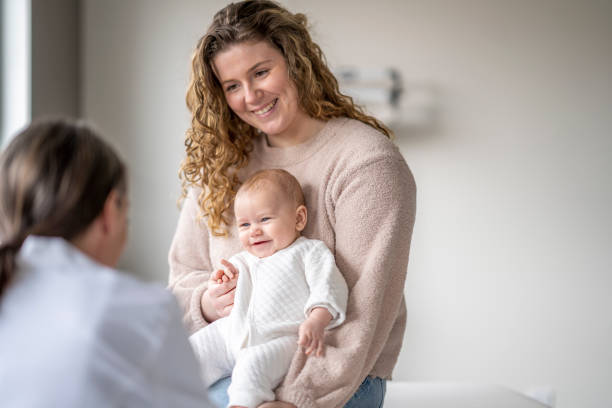 istock Mom and Baby at an Appointment 1388268563
