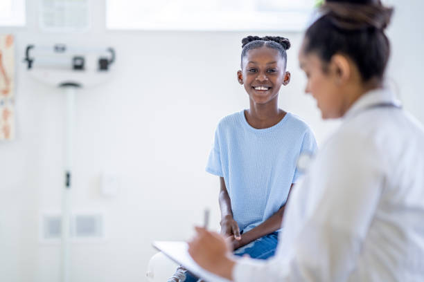 istock African Girl at a Doctors Appointment 1388268580