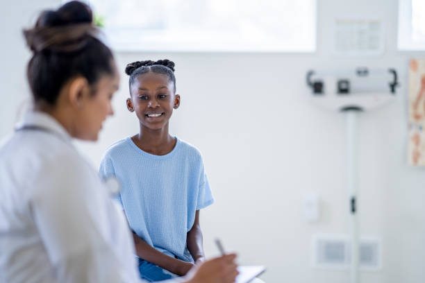 istock African Girl at a Doctors Appointment 1388268585