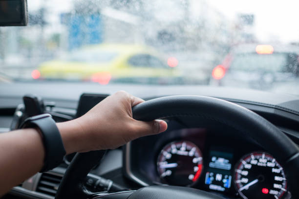 istock hand on steering wheel, driver, travel on holiday 1388270904