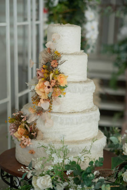 istock Beautiful wedding cake with blur background 1388270984