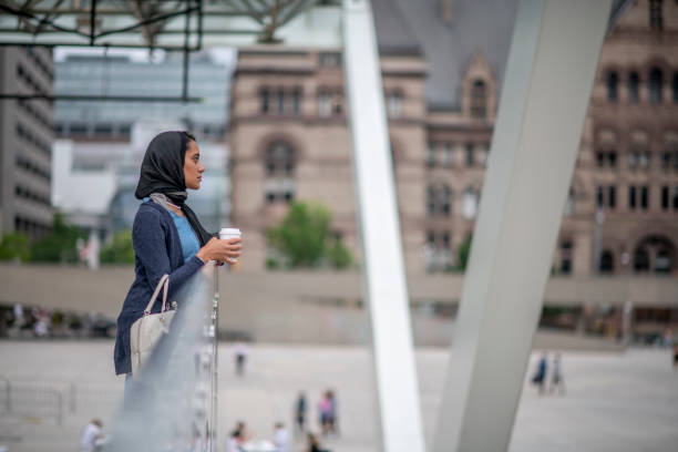 istock Muslim Woman Walking to Work 1388273427