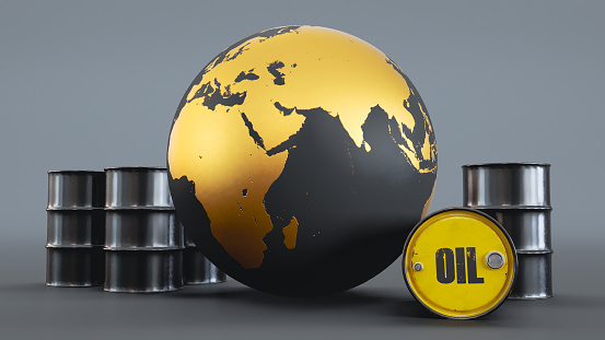 3D render of gold Oil barrels with Earth Globe isolated on black background.. Oil crisis concept
