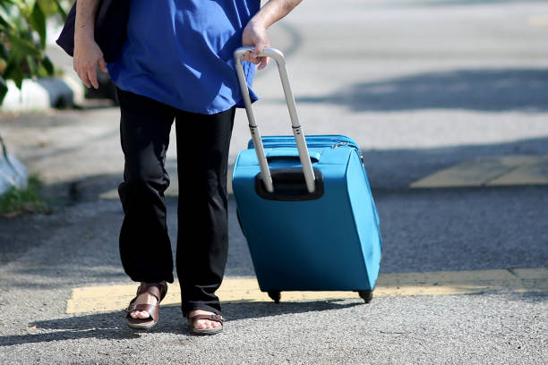istock Travelling with Luggage 1388275634