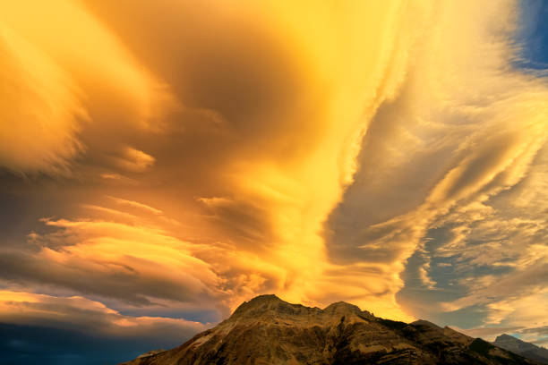 Stunning views on sunset colors on lenticular clouds in Waterton National Park in Alberta Canada