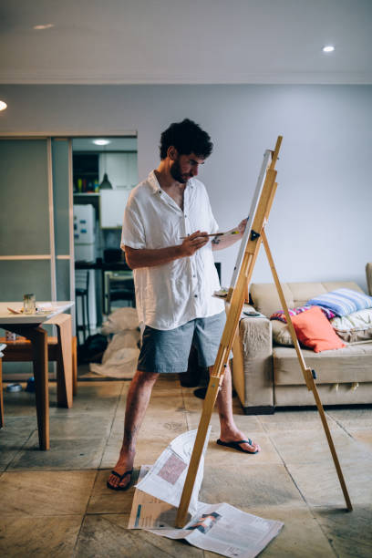 istock Artist painting at home 1388276751