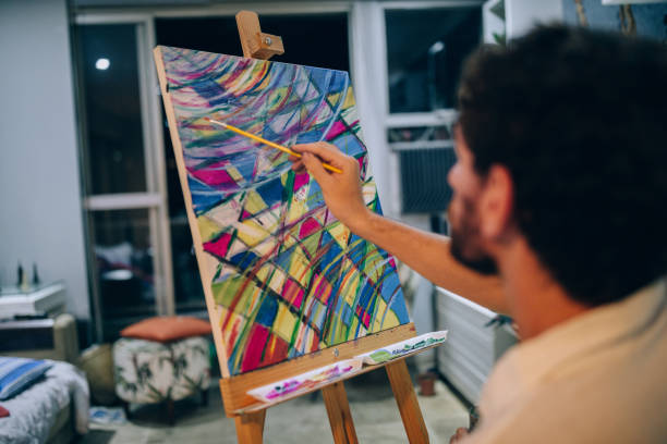 istock Artist painting at home 1388276814