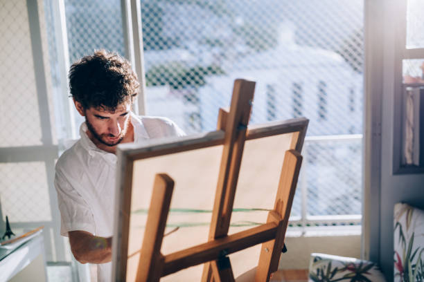 istock Artist painting at home 1388276822
