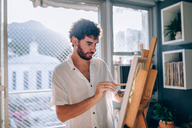 istock Artist painting at home 1388276849