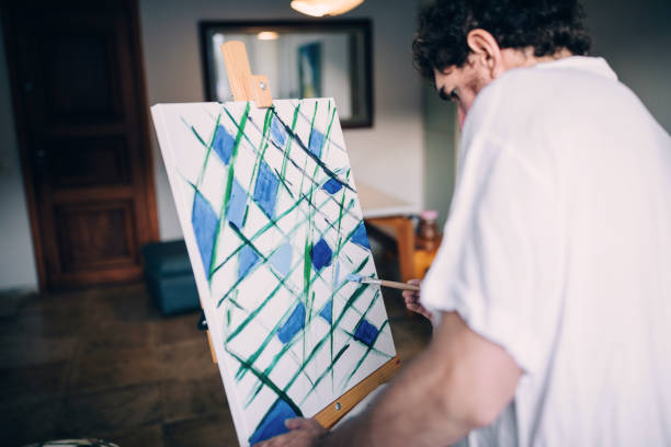istock Artist painting at home 1388276866