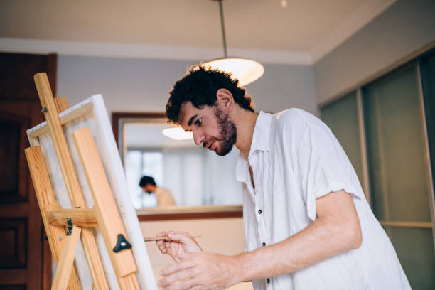 istock Artist painting at home 1388276891