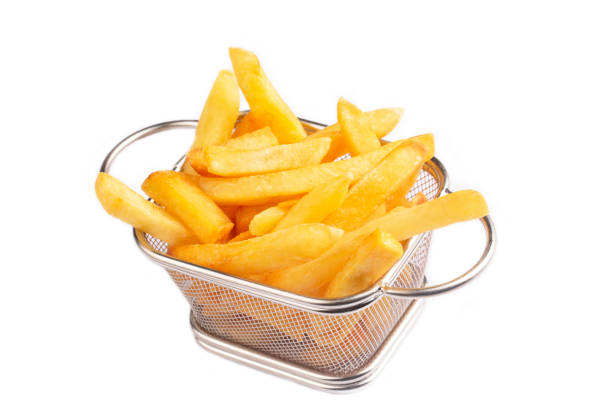 istock French fries, fried potatoes on white background 1388277813