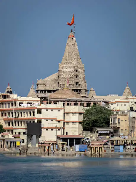 View of Dwarkadheesh temple and Gomatighat in Dwarka, India.