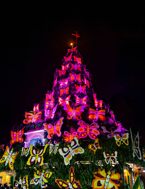 istock Butterfly flower decorations under colored lighting on Dagdusheth Ganesh temple for festival in Pune,India 1388289436