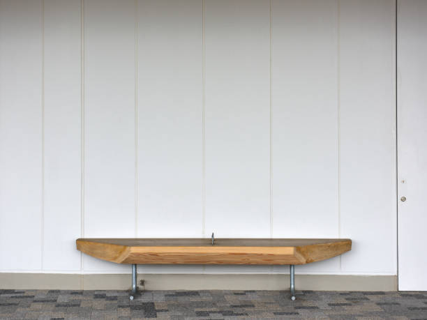 istock Empty wooden bench in the aisle 1388290313