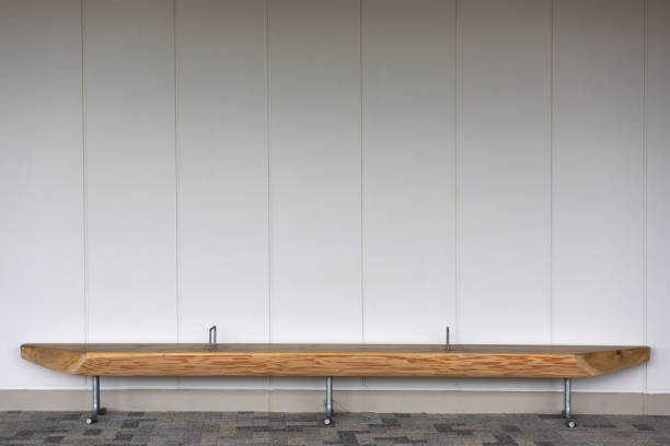 istock Empty wooden bench in the aisle 1388290314