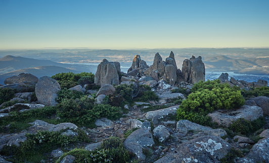 Dusk image of the dolerite rocks at the Summit of Mt Wellington above Hobart.  Cool blue period. The Derwent river can be seen in the distance.