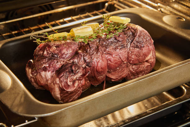 istock Beef with rosemary and butter is ready for baking in the oven 1388302070