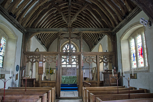 Interior of the historic St Mary's church in the Hampshire village of Hartley Wespall.  The wooden beams date to medieval times.