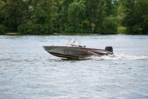 istock A man quickly floats on a motor boat on the river 1388302603