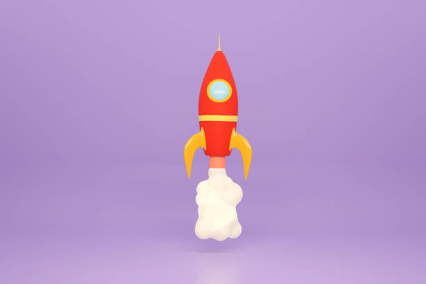 istock Space rocket red color on lilac background. Space technology in cartoon style. 3d rendering 1388307864