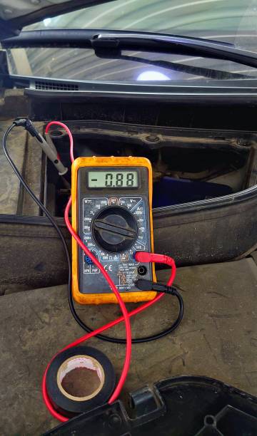 istock Check for car battery current leakage on the car 1388322983