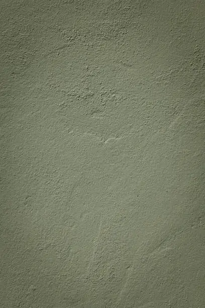 Part of a painted concrete wall.