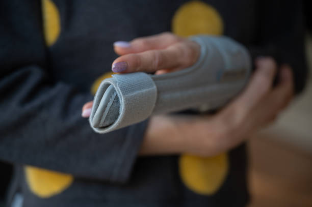 istock Injured finger in orthopedic brace 1388327874