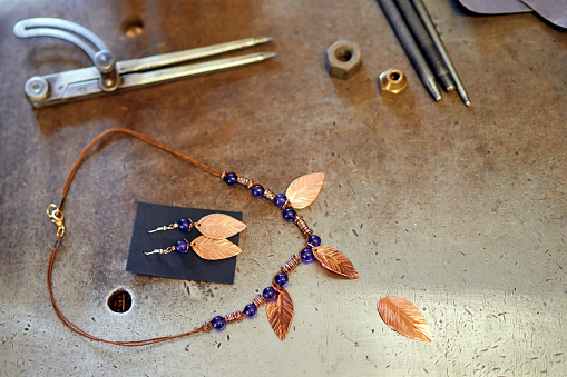 Handmade necklaces in a jewelry workshop