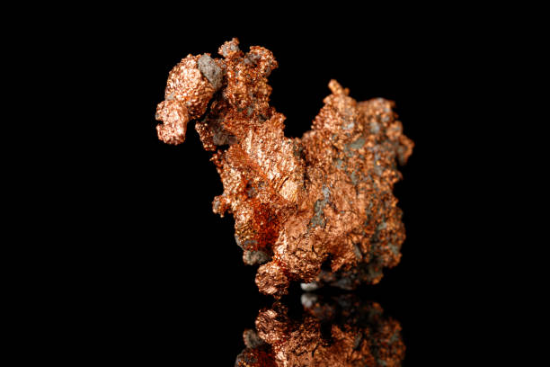 istock Macro mineral stone Copper on black background 1388334908