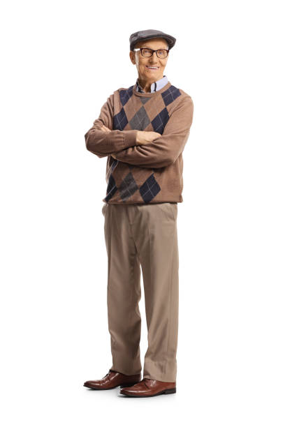 istock Smiling casual elderly man posing with crossed arms 1388338006