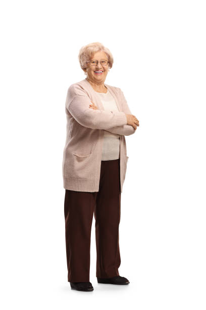 istock Smiling casual elderly woman posing 1388338020