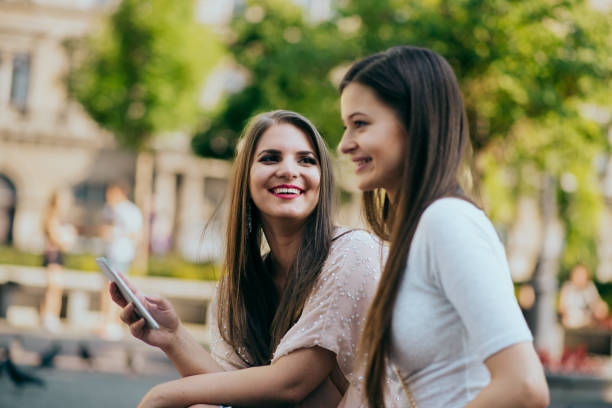 istock women talking in the park 1388339648
