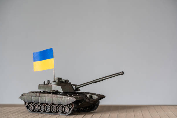istock Toy tanks with Ukrainian flag 1388348135